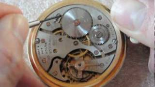 How to unwind a pocket watch mainspring [upl. by Ardnuasac]