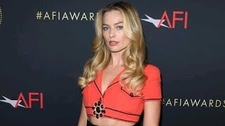 Margot Robbie Wears Chanel Look Modeled by Claudia Schiffer at AFI Luncheon [upl. by Shaddock]