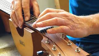 Adjusting a SteelString Guitar by Luthier Marcel Hustings wwwalphenaarcom [upl. by Ahtebat]