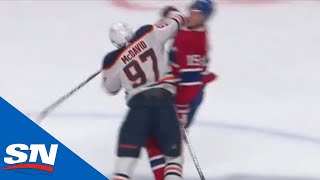 Connor McDavid Hits Jesperi Kotkaniemi With High Elbow At Centre Ice [upl. by Borer496]