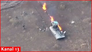 Drone footage shows Russian soldiers trying to escape from burning equipment for salvation [upl. by Aiyn668]