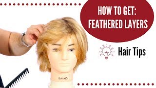 How to Get Feathered Hair  TheSalonGuy [upl. by Ahsiekam]