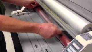 Loading film on GBC Laminator [upl. by Nnairet]