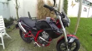 Derbi Mulhacen 125 Cafe review comparison KTM Duke 125cc [upl. by Aerdnaz]