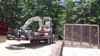 Mini Excavator Unloading mud mats [upl. by Auohp]