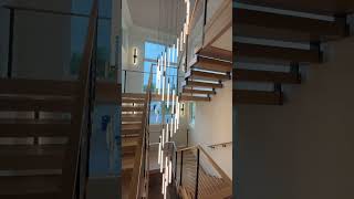 Double stringer floating stairs Keuka Studios stairscase architecture [upl. by Marvel]