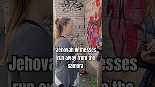 Jehovah Witnesses refuse to answer any questions and run away from the camera rome [upl. by Treacy556]