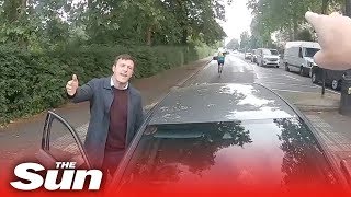 Motorist drives into vigilante cyclist as he stops driver on wrong side of road [upl. by Kristian]