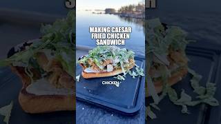 CAESAR FRIED CHICKEN SANDWICH BY THE WATER ❤️‍🔥🍗🌊 friedchicken food cooking outdoorcooking [upl. by Sivolc]