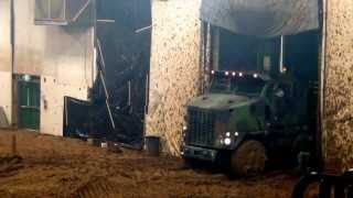 8x8 Heavy Equipment Transporter drives through mud bog [upl. by Gifferd]