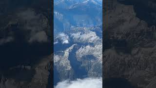 Alps from an airplane window travel mountains switzerland [upl. by Armanda78]