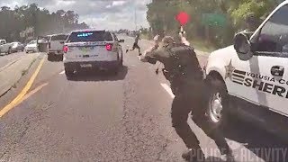 Bodycam Shows Police Shootout With Armed Carjacking Suspect in Florida [upl. by Einahets734]