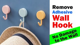 How to remove adhesive wall hooks  No damage to the wall paint [upl. by Horwitz508]