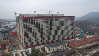 GLOBALink  Raising pigs in a 26story building in central China [upl. by Ahsinej818]