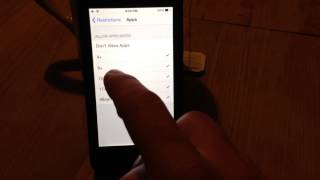 Enable and Disabling Restrictions on an iPhone iOS 7 How to [upl. by Millhon681]