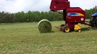 New Holland BR7060 Crop Cutter Round Baler powered by T6155 Tractor 2013 NC Hay Day [upl. by Nirehtac676]