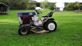 Mowing wet grass with a 52 year old mower  48 inch cut Sears Suburban SS14 repowered with a K301 [upl. by Lrak]