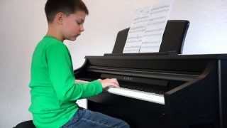 8 year old piano kid playing Bach [upl. by Milak]