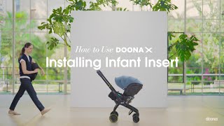 How to install the infant insert  Doona X Car Seat amp Stroller [upl. by Osmo]