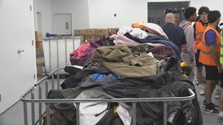 Warners Warmup delivers Donated coats go to Operation Food Search for distribution [upl. by Elayor]