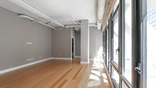 A 2bedroom 2bath Streeterville loft at Axis steps from Ohio Street Beach [upl. by Fadiman]