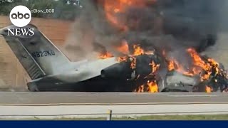 Plane crashes onto busy Florida highway [upl. by Ruddy983]