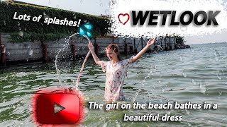 Girl bathed in a dress on the beach👗 Wetlook bath 4K [upl. by Jesh]