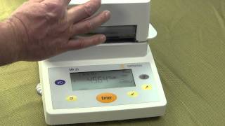 Moisture Analyzer  how to use a moisture balance [upl. by Leira]