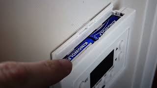 Carrier Thermostat  How to Change Batteries [upl. by Ahsinav44]