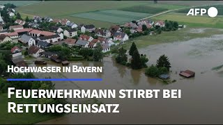 Hochwasser Feuerwehrmann stirbt bei Rettungseinsatz in Bayern  AFP [upl. by Auqinehs]