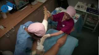 Cleaning and bandaging a leg after phlebectomies of varicose veins [upl. by Ketti942]