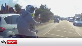 Road rage driver knocks motorcyclist off bike after 50mph chase [upl. by Hennessy406]