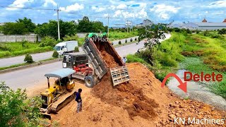 Project Landfill Starting Old Bulldozer Pushing amp Truck Dumping Soil Into Small Canal Near The Road [upl. by Schwejda]