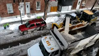 REMOVING SNOW ON MY STREET IN MONTREAL CANADA [upl. by Yrrat]