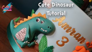 CAKE NATION  How To Make a Cute Fondant Dinosaur TRex Cake Topper [upl. by Holey]