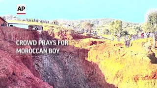 Crowd prays for Moroccan boy trapped in well [upl. by Nwahsav]