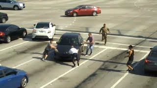 Good Samaritans get out of their cars to stop vehicle from drifting into busy Florida intersection [upl. by Ahsienyt]