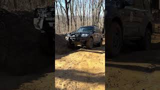 Mitsubishi PajeroShogunMontero Limited working a wet rocky section at Windrock OffRoad Park [upl. by Siroled]