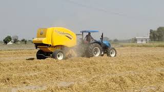 New Holland Workmaster 105 with RB 150 Round Baler workmaster105 newhollandagriculture [upl. by Peggie645]