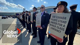 Air Canada pilots stage silent picket at Toronto’s Pearson airport [upl. by Noynek930]