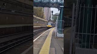 707 008 departs at Woolwich dockyard and 707 026 arrives at Woolwich dockyard with a 2 tone horn [upl. by Analra400]