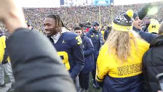 Michigan fans rush the field after win over Ohio State [upl. by Leshia]