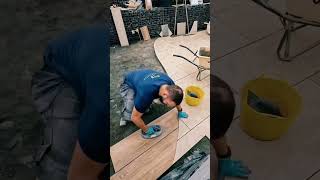 Cutting a curve in porcelain to transition from a 900x600 tile to 1200x300 prank porcelain fly [upl. by Cyprian413]