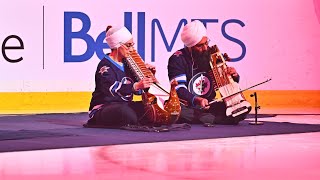 Canadian national anthem sung in Punjabi at Winnipeg Jets game during South Asian Heritage night [upl. by Manvil545]