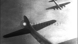 A burning American B17 aircraft falls through clouds in Germany HD Stock Footage [upl. by Zacharia]