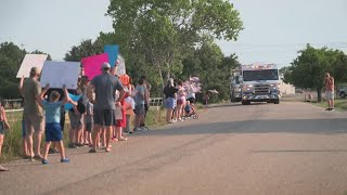 Firefighter makes triumphant return home after being injured in a house fire [upl. by Halilad]