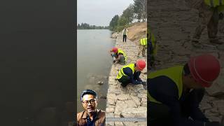 Construction of embankment using gabion baskets construction quanhuychannel [upl. by Johnathan]