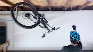 Hide A Bike  Store your bike against your ceiling in seconds [upl. by Nolyarg]