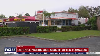 Debris lingers one month after Ocala tornado [upl. by Pantheas]