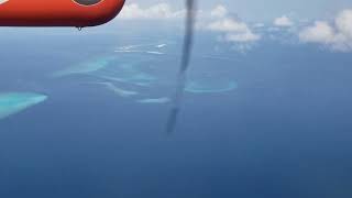 Trans Maldivian Airways Seaplane Flying Over North Male Atoll View of the Joy Island July 2024 [upl. by Denise]